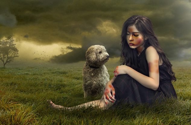 A woman sitting with her dog. Image by Alan Dobson from Pixabay.&nbsp;